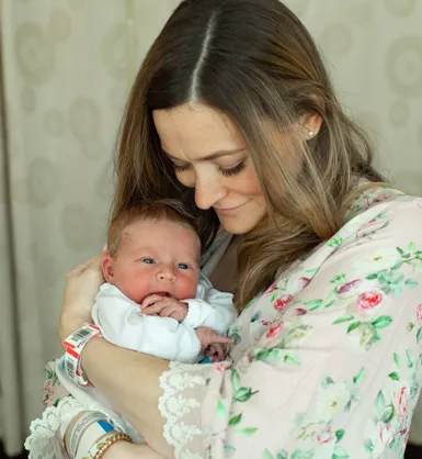 Mother holding her newborn baby