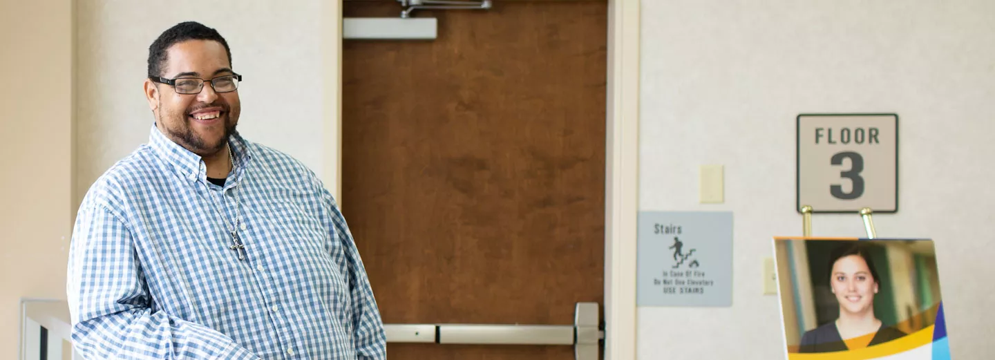 Man smiling in a Ballad Health facility